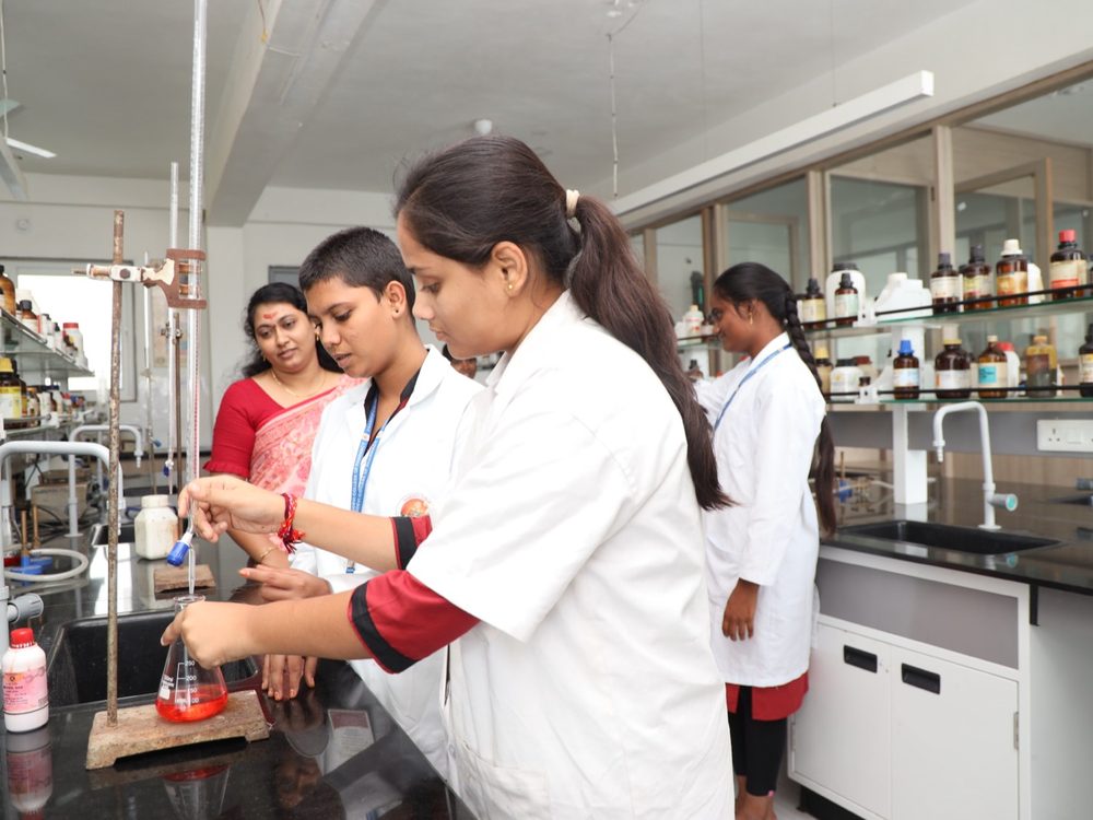 Students at work in a Vaagdevi College of Pharmacy laboratory